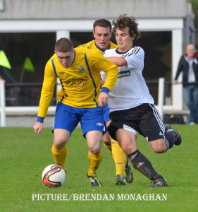 Neil Barr shields the ball from a Rathfriland player