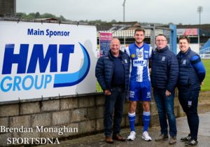 Chairman Martin McLoughlin with new signing Lee Newell, Vice Chairman Gary Wilson and Manager Gary Boyle - Brendan Monaghan Photography